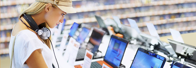 Pretty lady in retail computer store