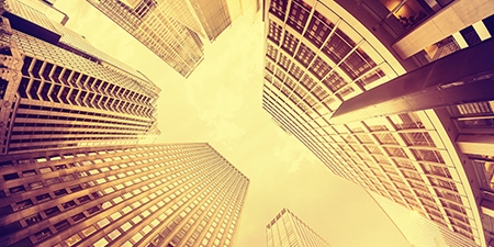 Fisheye lens vintage toned photo of skyscrapers in Manhattan at